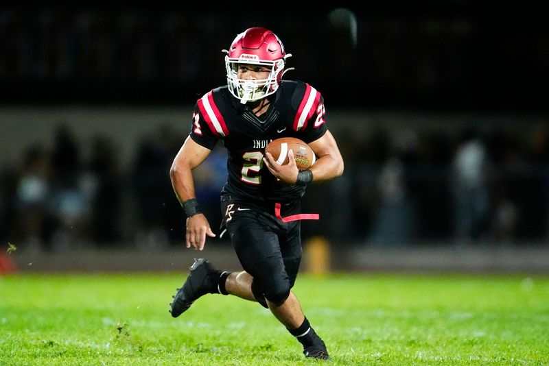 Palm Springs' Jordan Johnson (24) runs the ball during the win against Segerstrom in Palm Springs, Calif., on Friday, August 22, 2025.
