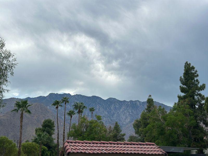 Dark clouds above Mount San Jacinto were visible from the desert floor on Sunday, Aug. 24, 2025 in Palm Springs, Calif.