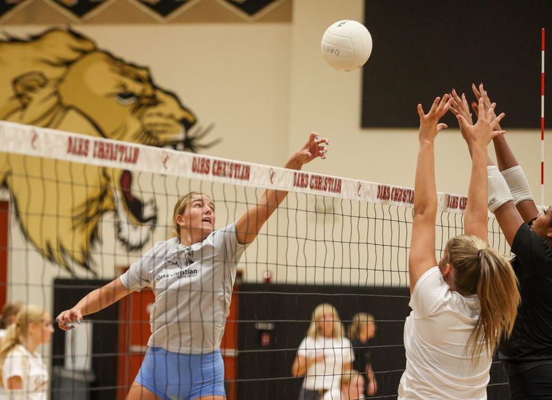Oaks Christian School outside hitter Sadie Kocur hits at the net during a practice on Aug. 20, 2025, in Westlake Village.