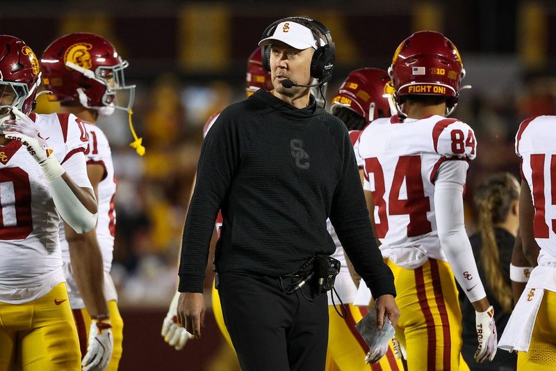 Oct 5, 2024; Minneapolis, Minnesota, USA; USC Trojans head coach Lincoln Riley looks on during the first half against the Minnesota Golden Gophers at Huntington Bank Stadium. Mandatory Credit: Matt Krohn-Imagn Images