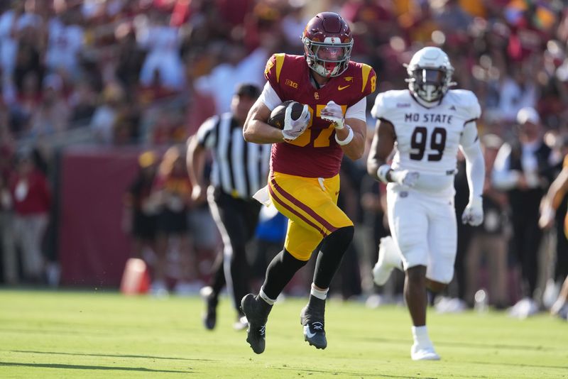 Aug 30, 2025; Los Angeles, California, USA; Southern California Trojans tight end Lake McRee (87) scores on a 62-yard touchdown reception against the Missouri State Bears in the first half at United Airlines Field at Los Angeles Memorial Coliseum. Mandatory Credit: Kirby Lee-Imagn Images