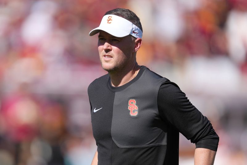 Aug 30, 2025; Los Angeles, California, USA; Southern California Trojans head coach Lincoln Riley reacts during the game against the Missouri State Bears at United Airlines Field at Los Angeles Memorial Coliseum. Mandatory Credit: Kirby Lee-Imagn Images