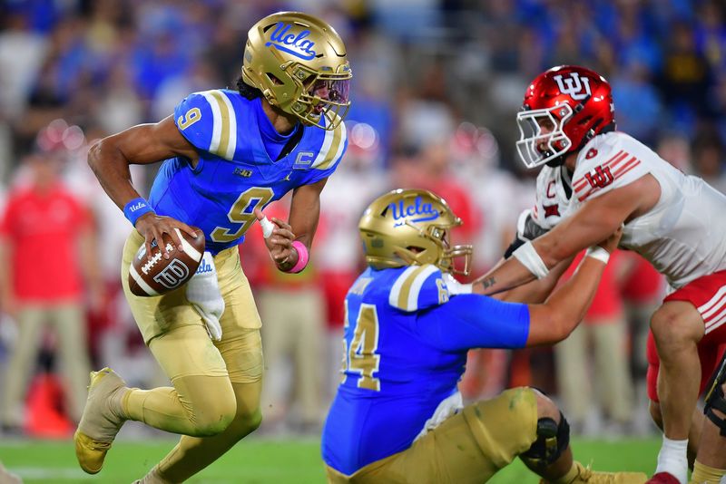 Aug 30, 2025; Pasadena, California, USA; UCLA Bruins quarterback Nico Iamaleava (9) runs the ball as offensive lineman Sam Yoon (64) provides coverage against Utah Utes linebacker Lander Barton (8) during the second half at Rose Bowl. Mandatory Credit: Gary A. Vasquez-Imagn Images