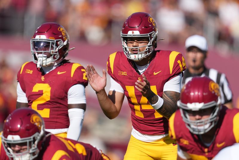 Aug 30, 2025; Los Angeles, California, USA; Southern California Trojans quarterback Jayden Maiava (14) prepares to take the snap against the Missouri State Bears in the first half at United Airlines Field at Los Angeles Memorial Coliseum. Mandatory Credit: Kirby Lee-Imagn Images