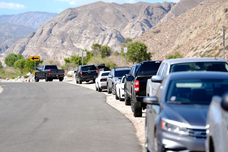 Cars park along Whitewater Canyon Road to access public lands in Whitewater, Calif., on Labor Day, September 1, 2025.