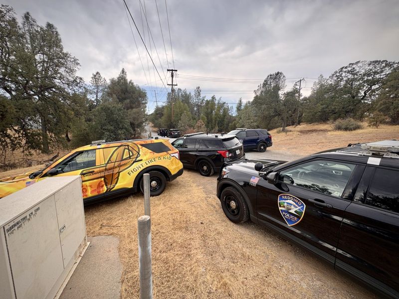 Several police vehicles are parked in the area of Abernathy Lane and Old Alturas Road where two authorities said two people were shot inside a home on Tuesday, Sept. 2, 2025.