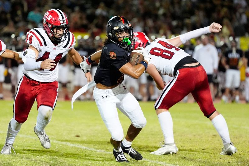 Palm Desert wide receiver Jonah Toland (1) gains yards against Elsinore in Palm Desert, Calif., on Friday, Sept. 5, 2025.