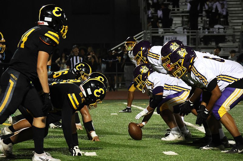 The Enterprise defense lines up against Oakland Tech in a game on Sept. 5, 2025. The Bulldogs won the matchup 32-3, handing the Hornets their second straight loss to open the season.