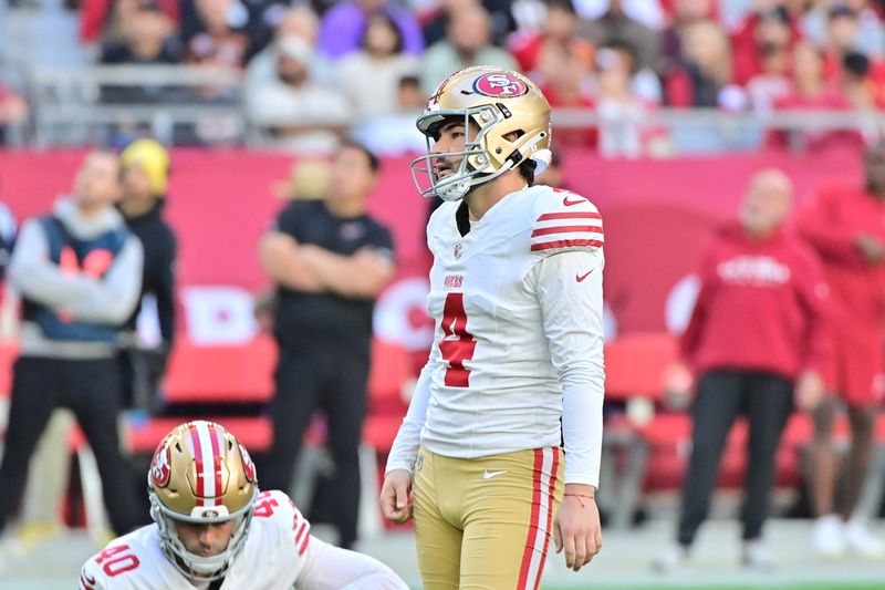 Jan 5, 2025; Glendale, Arizona, USA; San Francisco 49ers place kicker Jake Moody (4) reacts after missing a field goal in the first half against the Arizona Cardinals at State Farm Stadium. Mandatory Credit: Matt Kartozian-Imagn Images