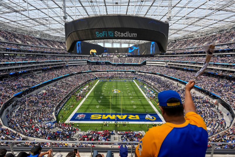 Sep 7, 2025; Inglewood, California, USA; View of the stadium with a Los Angeles Rams fan before the game at SoFi Stadium. Mandatory Credit: Kirby Lee-Imagn Images