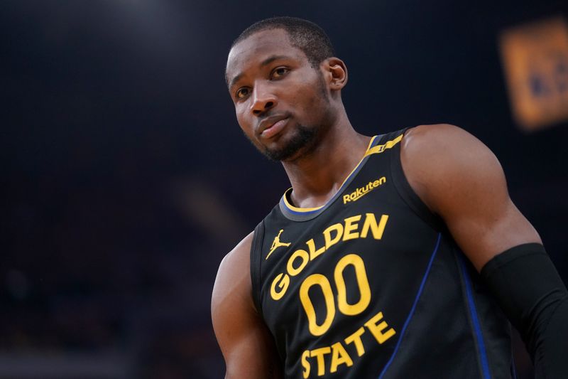May 12, 2025; San Francisco, California, USA; Golden State Warriors forward Jonathan Kuminga (00) stands on the court before a play against the Minnesota Timberwolves in game four of the second round for 2025 NBA Playoffs. Mandatory Credit: Cary Edmondson-Imagn Images