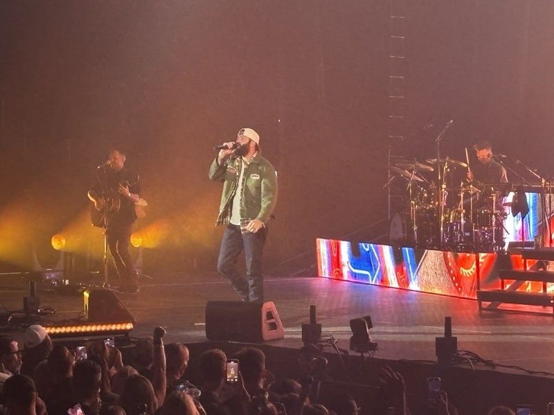 Jordan Davis performing at Acrisure Arena in Palm Desert, Calif. on the first night of his "Ain't Enough Road" Tour on Thursday, Sept. 12, 2025.