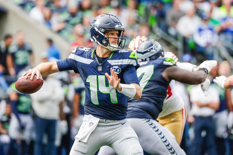Sep 7, 2025; Seattle, Washington, USA; Seattle Seahawks quarterback Sam Darnold (14) passes against the San Francisco 49ers during the fourth quarter at Lumen Field. Mandatory Credit: Joe Nicholson-Imagn Images