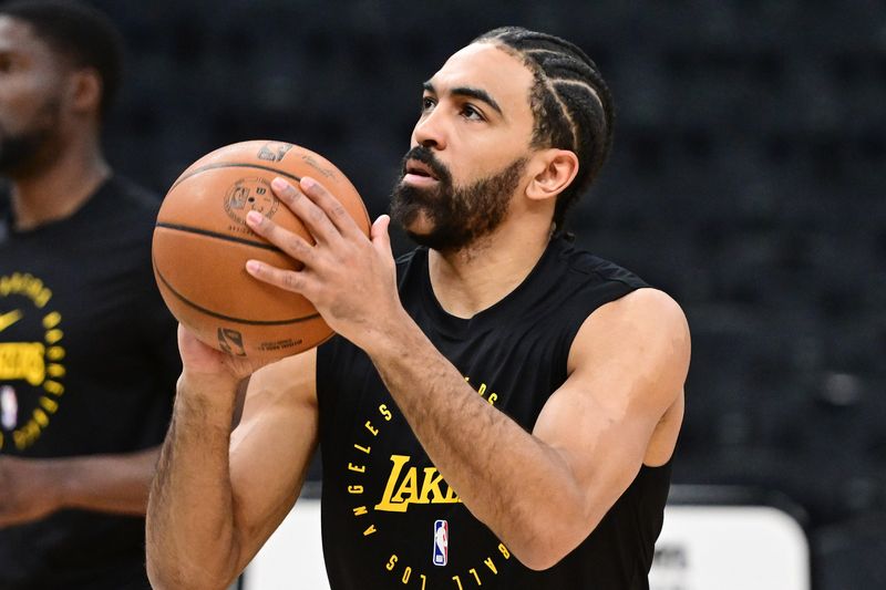 Mar 13, 2025; Milwaukee, Wisconsin, USA; Los Angeles Lakers guard Gabe Vincent (7) warms up before a game against the Milwaukee Bucks at Fiserv Forum. Mandatory Credit: Benny Sieu-Imagn Images