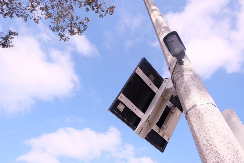 A Flock Safety-branded license plate reader camera site on a lamppost near the intersection of Peacock Drive and Bristol Road in Ventura on Sept. 9, 2025.