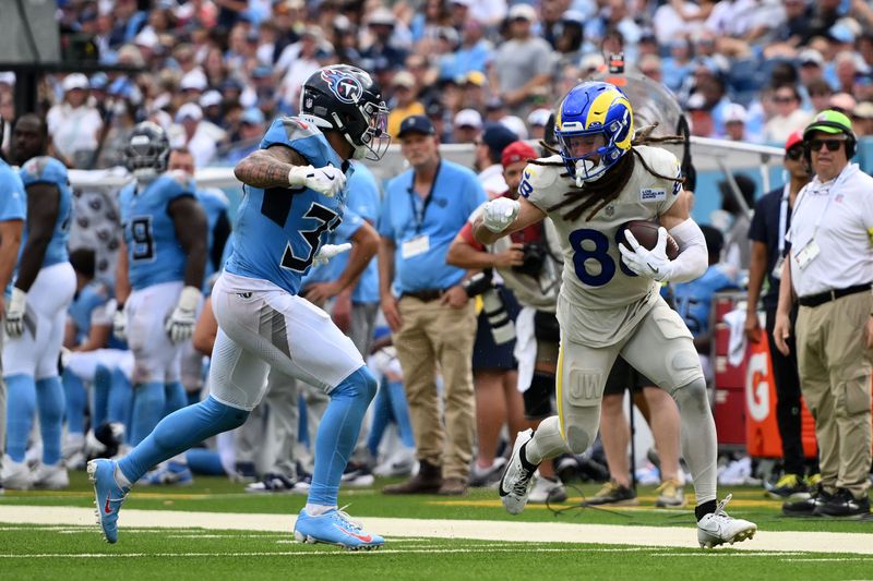 Sep 14, 2025; Nashville, Tennessee, USA; Los Angeles Rams wide receiver Jordan Whittington (88) makes a catch against the Tennessee Titans during the second half at Nissan Stadium. Mandatory Credit: Steve Roberts-Imagn Images