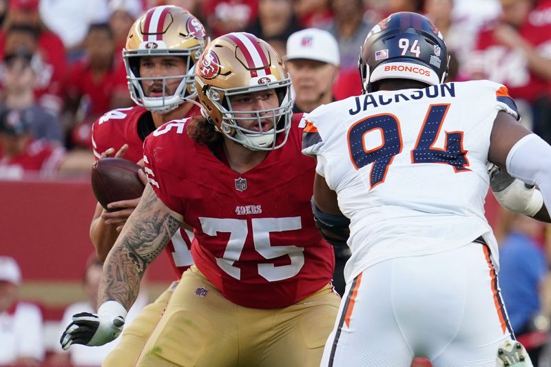 Aug 9, 2025; Santa Clara, California, USA; San Francisco 49ers offensive lineman Connor Colby (75) pass protects San Francisco 49ers quarterback Tanner Mordecai (4) against Denver Broncos defensive lineman Jordan Jackson (94) in the second quarter at Levi's Stadium. Mandatory Credit: David Gonzales-Imagn Images