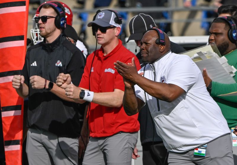 Nov 30, 2024; Pasadena, California, USA; Fresno State Bulldogs head coach Tim Skipper (far right) during the section quarter against the UCLA Bruins at Rose Bowl. Mandatory Credit: Robert Hanashiro-Imagn Images