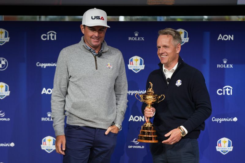 U.S. captain Keegan Bradley and European captain Luke Donald with the Ryder Cup.