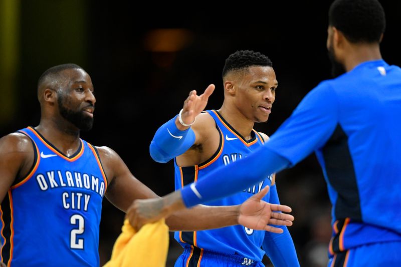 Jan 20, 2018; Cleveland, OH, USA; Oklahoma City Thunder guard Raymond Felton (2) and guard Russell Westbrook (0) celebrate in the fourth quarter against the Cleveland Cavaliers at Quicken Loans Arena. Mandatory Credit: David Richard-USA TODAY Sports