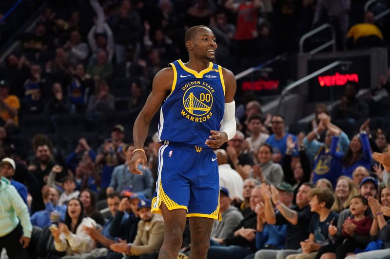 Oct 30, 2024; San Francisco, California, USA; Golden State Warriors forward Jonathan Kuminga (00) celebrates a basket during the fourth quarter against the New Orleans Pelicans at Chase Center. Mandatory Credit: David Gonzales-Imagn Images
