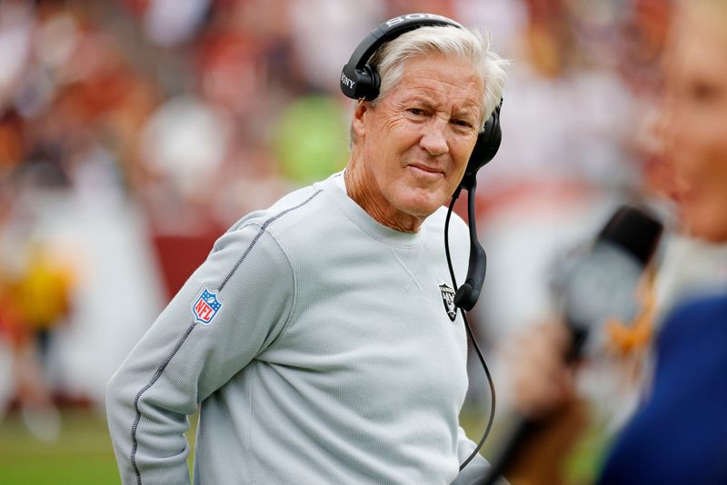 Sep 21, 2025; Landover, Maryland, USA; The Las Vegas Raiders head coach Pete Carroll looks on from the sidelines during the first half against the Washington Commanders at Northwest Stadium. Mandatory Credit: Amber Searls-Imagn Images