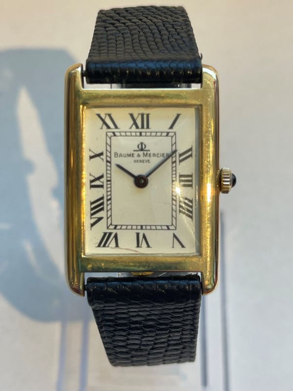 A 14k gold Baume & Mercier tank watch like this one is a top quality classic at a down-to-earth price.