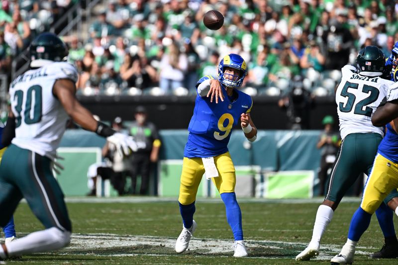 Sep 21, 2025; Philadelphia, Pennsylvania, USA; Los Angeles Rams quarterback Matthew Stafford (9) drops back to pass against the Philadelphia Eagles during the first half at Lincoln Financial Field. Mandatory Credit: Eric Hartline-Imagn Images