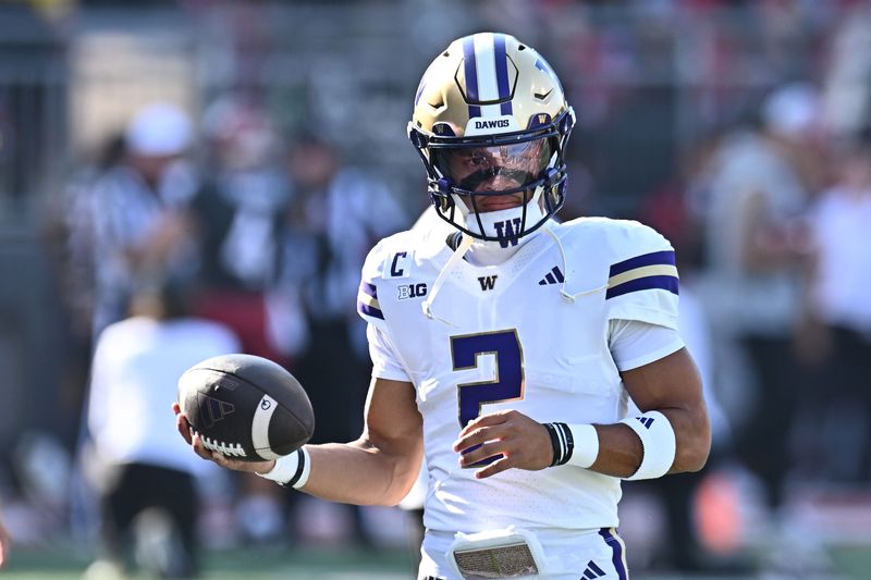 Sep 20, 2025; Pullman, Washington, USA; Washington Huskies quarterback Demond Williams Jr. (2) warms up before Apple Cup game against the Washington State Cougarsat Gesa Field at Martin Stadium. Mandatory Credit: James Snook-Imagn Images