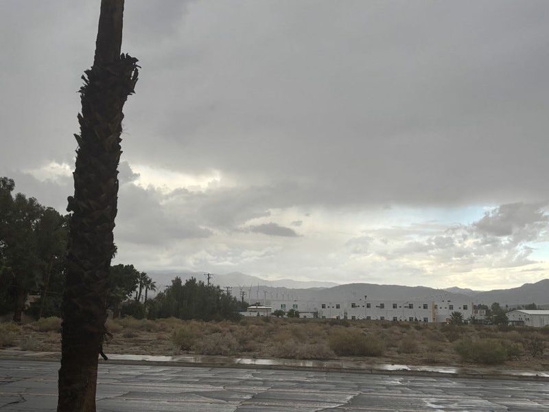 Storm clouds and wet roads are visible in north Palm Springs as storms moved through the area on Saturday, Sept. 27, 2025.