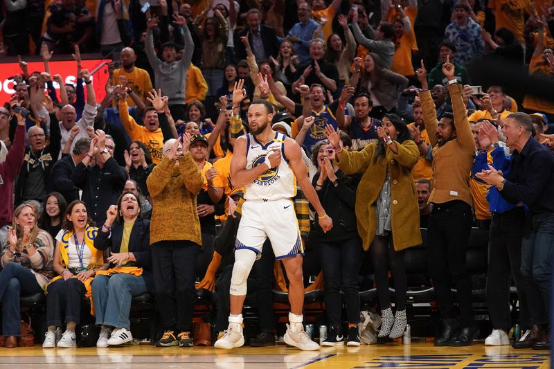 Apr 15, 2025; San Francisco, California, USA; Golden State Warriors guard Stephen Curry (30) reacts after making a three point basket against the Memphis Grizzlies in the fourth quarter at the Chase Center. Mandatory Credit: Cary Edmondson-Imagn Images