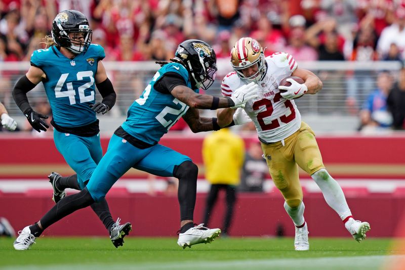 Sep 28, 2025; Santa Clara, California, USA; San Francisco 49ers running back Christian McCaffrey (23) runs the ball during the second half against the Jacksonville Jaguars at Levi's Stadium. Mandatory Credit: Kyle Terada-Imagn Images