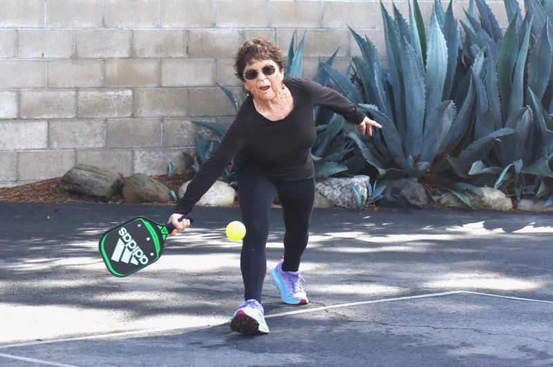 Denice Lombard of Ventura plays pickleball on Sept. 24. The exercise is part of her regimen of taking care of the kidney her father gave her in a 1967 transplant.