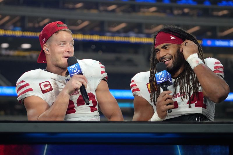 Oct 2, 2025; Inglewood, California, USA; San Francisco 49ers running back Christian McCaffrey (23) and middle linebacker Fred Warner (54) on the Prime Thursday Night Football set after the game against the Los Angeles Rams at SoFi Stadium. Mandatory Credit: Kirby Lee-Imagn Images