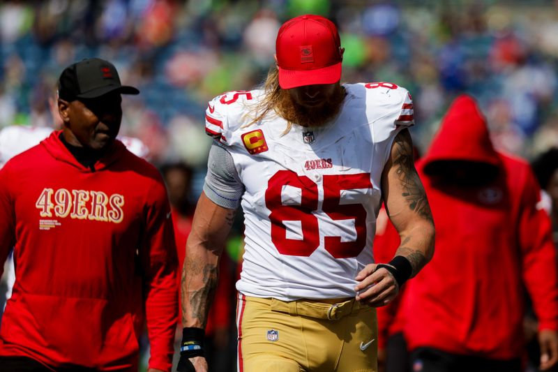 Sep 7, 2025; Seattle, Washington, USA; San Francisco 49ers tight end George Kittle (85) returns to the locker room for halftime against the Seattle Seahawks at Lumen Field. Mandatory Credit: Joe Nicholson-Imagn Images