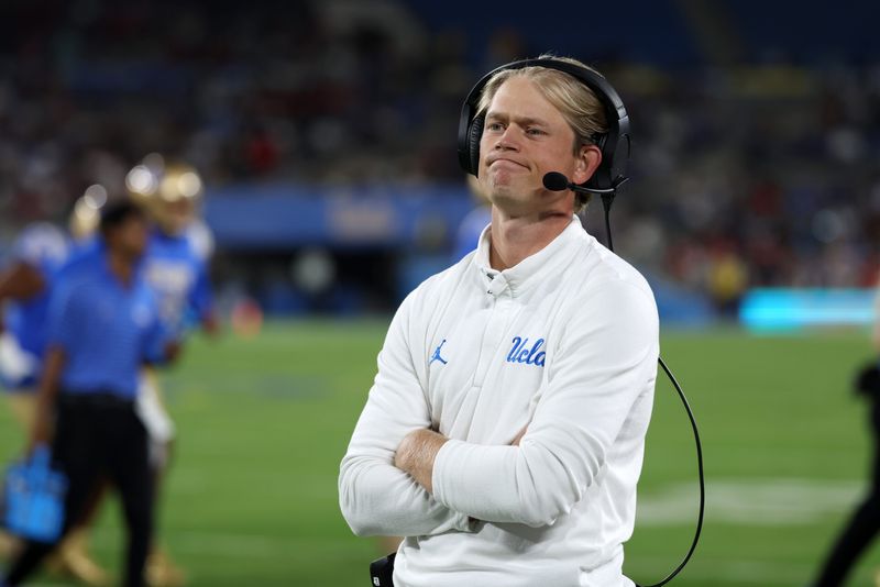 Sep 12, 2025; Pasadena, California, USA; UCLA Bruins assistant head coach Jerry Neuheisel looks on during the second half against the New Mexico Lobos at Rose Bowl.