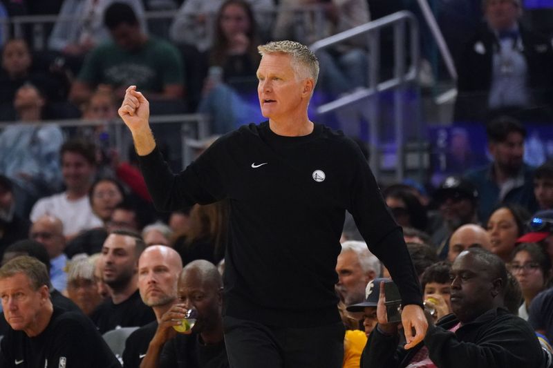 Oct 5, 2025; San Francisco, California, USA; Golden State Warriors head coach Steve Kerr coaches his team against the Los Angeles Lakers in the first quarter at Chase Center. Mandatory Credit: David Gonzales-Imagn Images