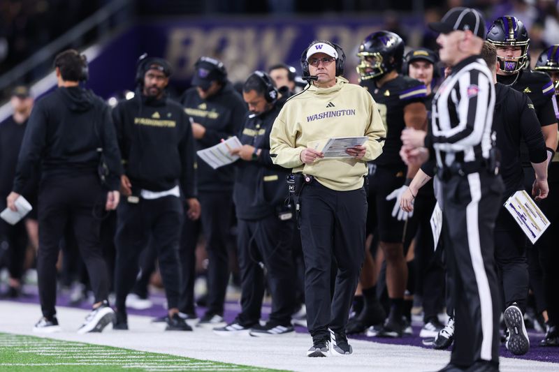 Oct 10, 2025; Seattle, Washington, USA; Washington Huskies head coach Jedd Fisch looks on from the sideline during the first half against the Rutgers Scarlet Knights at Husky Stadium. Mandatory Credit: Kevin Ng-Imagn Images