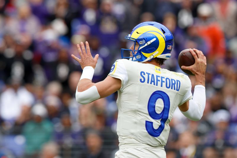 Oct 12, 2025; Baltimore, Maryland, USA; Los Angeles Rams quarterback Matthew Stafford (9) passes the ball against the Baltimore Ravens during the second quarter of the game at M&T Bank Stadium. Mandatory Credit: Peter Casey-Imagn Images