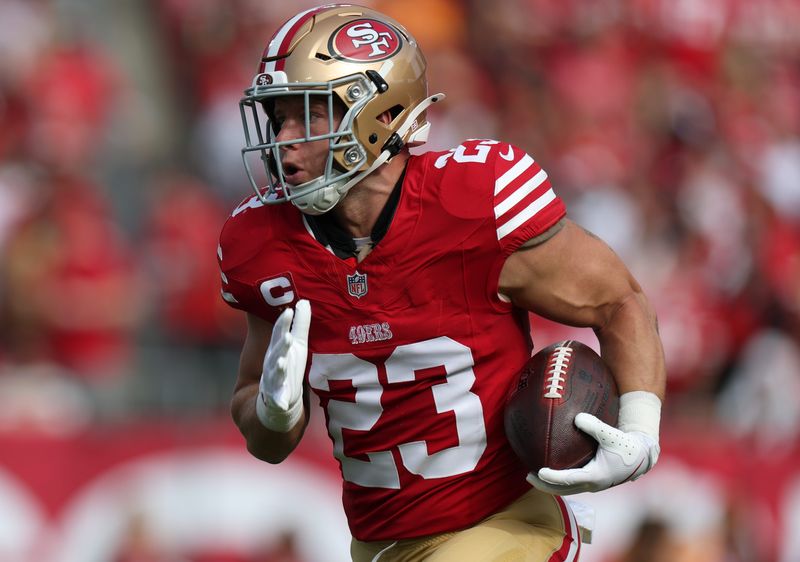 Oct 12, 2025; Tampa, Florida, USA; San Francisco 49ers running back Christian McCaffrey (23) runs for a gain during the first quarter against the Tampa Bay Buccaneers at Raymond James Stadium. Mandatory Credit: Nathan Ray Seebeck-Imagn Images
