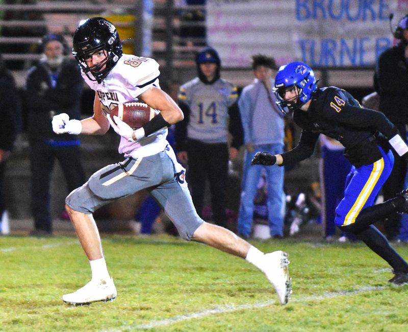 Hesperia's Daniel Serna looks to the sideline as he breaks free for a 71-yard touchdown pass during the third quarter against Serrano on Thursday, Oct. 16, 2025. Serrano beat Hesperia 36-35 in overtime.