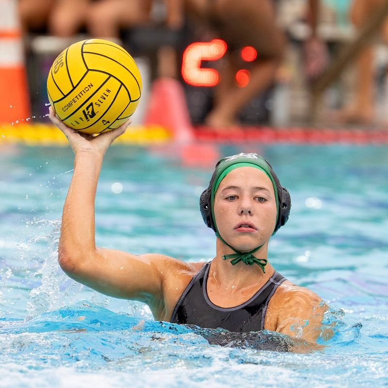 St. Mary’s Reyna Biedermann holds the ball while scanning for options during a recent girls water polo game.