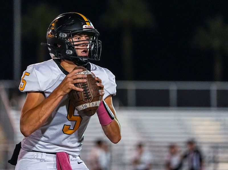 Yucca Valley quarterback Aiden Shannon looks to pass during warm ups before their game at Coachella Valley High School in Thermal, Calif., Friday, Oct. 17, 2025.
