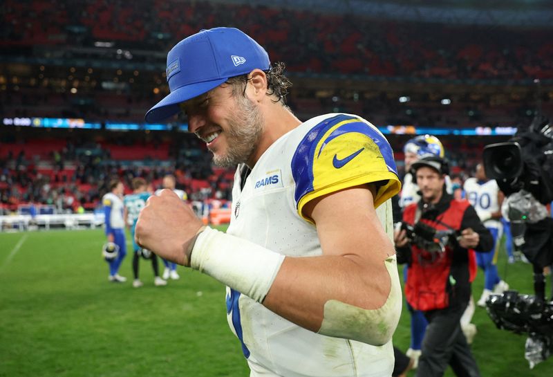 [US, Mexico & Canada customers only] Oct 19, 2025; London, United Kingdom; Los Angeles Rams quarterback Matthew Stafford (9) celebrates after their win against the Jacksonville Jaguars NFL International Series game at Wembley Stadium. Mandatory Credit: Andrew Boyers-Reuters via Imagn Images