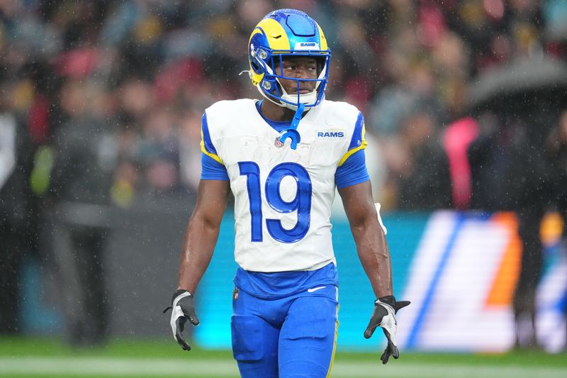 Oct 19, 2025; London, United Kingdom; Los Angeles Rams wide receiver Xavier Smith (19) warms up before a NFL International Series game between the Los Angeles Rams and the Jacksonville Jaguars at Wembley Stadium. Mandatory Credit: Kirby Lee-Imagn Images