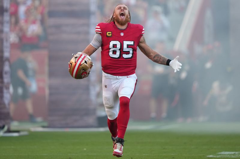 Oct 19, 2025; Santa Clara, California, USA; San Francisco 49ers tight end George Kittle (85) runs onto the field prior to the game against the Atlanta Falcons at Levi's Stadium. Mandatory Credit: Darren Yamashita-Imagn Images