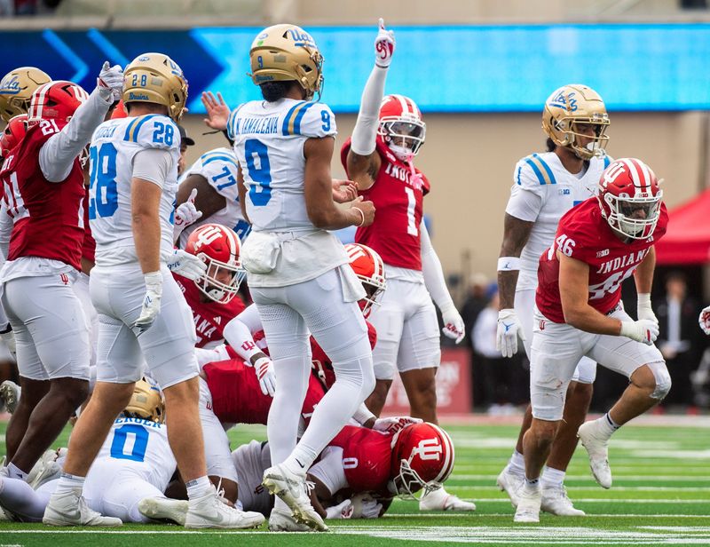 Indiana's Isaiah Jones (46) celebrates Hosea Wheeler's (0) fumble recovery during the Indiana versus UCLA football game at Memorial Stadium on Saturday, Oct. 25, 2025.