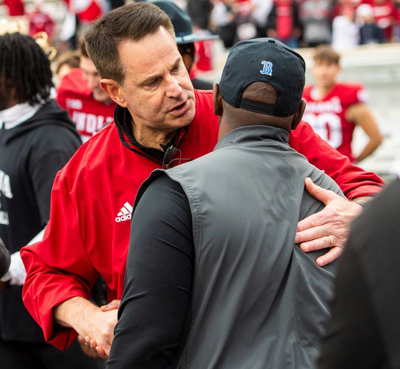 Indiana Head Coach Curt CIgnetti shakes UCLA Head Coach Tim Skipper's hand during the Indiana versus UCLA football game at Memorial Stadium on Saturday, Oct. 25, 2025.