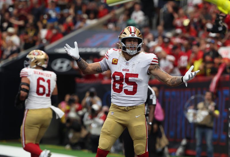 Oct 26, 2025; Houston, Texas, USA; San Francisco 49ers tight end George Kittle (85) celebrates a touchdown during the second quarter against the Houston Texans at NRG Stadium. Mandatory Credit: Troy Taormina-Imagn Images