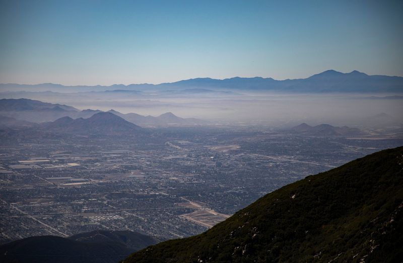 Smog is seen over San Bernardino from the side of Strawberry Peak in the San Bernardino National Forest, Thursday, Nov. 4, 2021, in Rimforest, Calif.